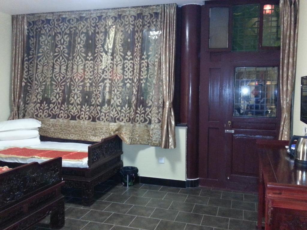 Pingyao Cheng Shi Ge Inn Room photo
